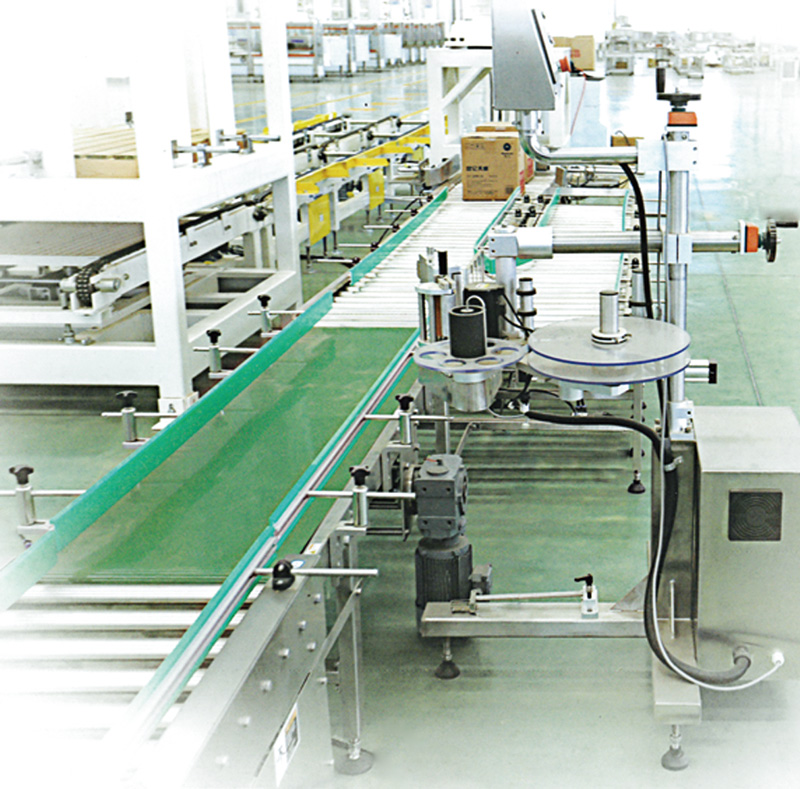 521626929795289.jpg TZY-1TG-A智能貼標(biāo)機現(xiàn)場.jpg