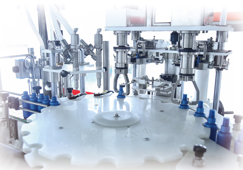 7991626916125557.jpg 灌裝旋蓋一體機(jī)局部.jpg